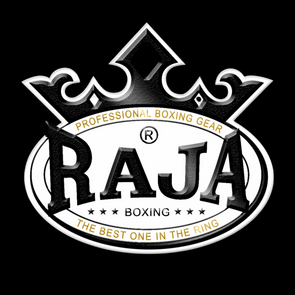 RAJA Muay Thai gear display – gloves, shorts, and shin guards handmade in Thailand