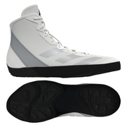 White high-top athletic shoes with black sole on a white background