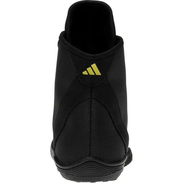 Black athletic shoe with a yellow logo on a white background