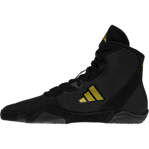 Black Adidas boxing shoe with gold stripes on a white background