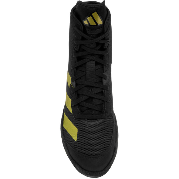 Black high-top sneaker with yellow stripes on a white background