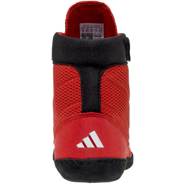 Red Adidas shoe with black accents on a white background