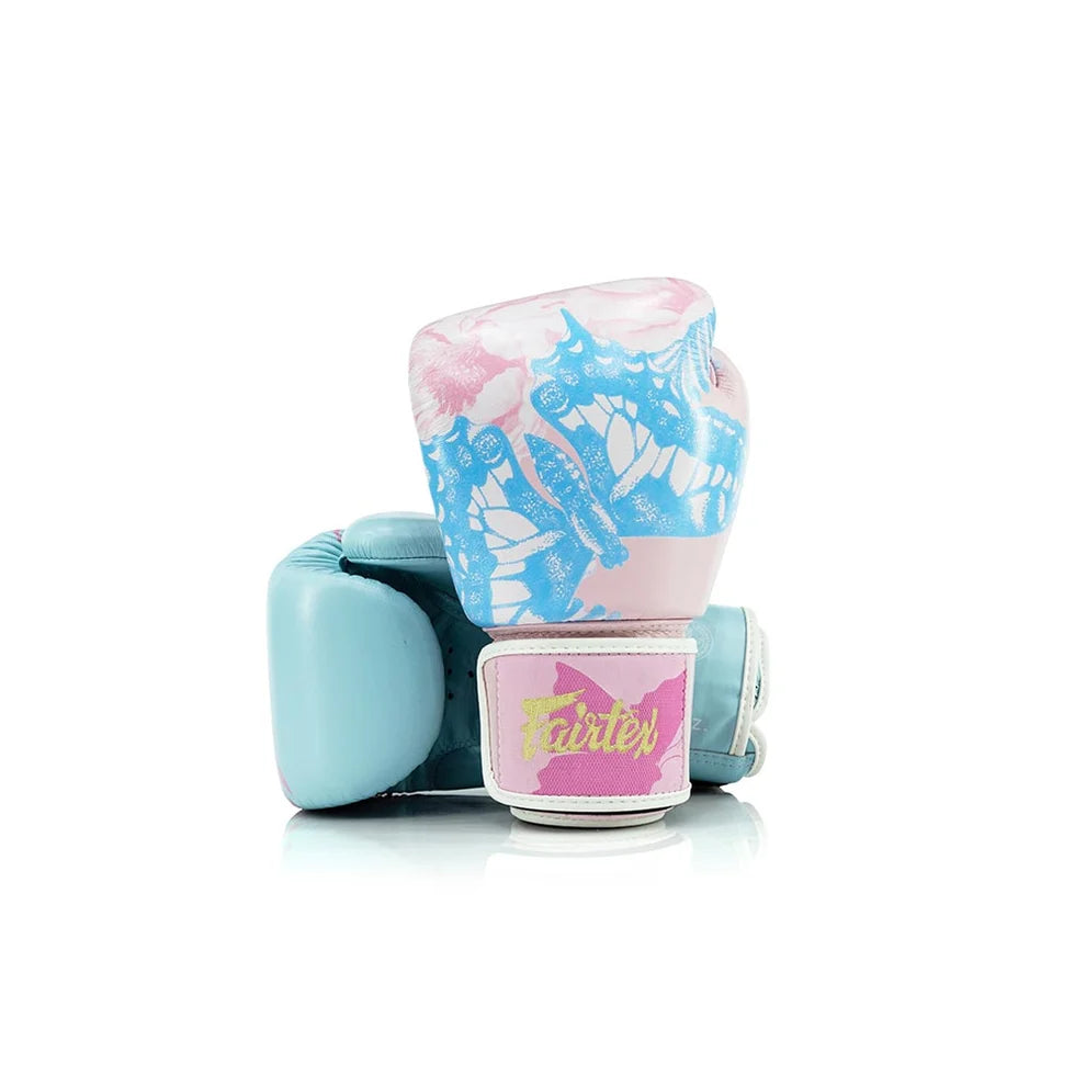 Pair of boxing gloves with floral design and brand name on a white background