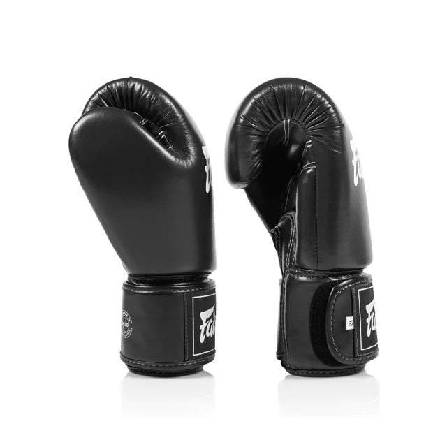 Pair of black boxing gloves with brand logo on a white background