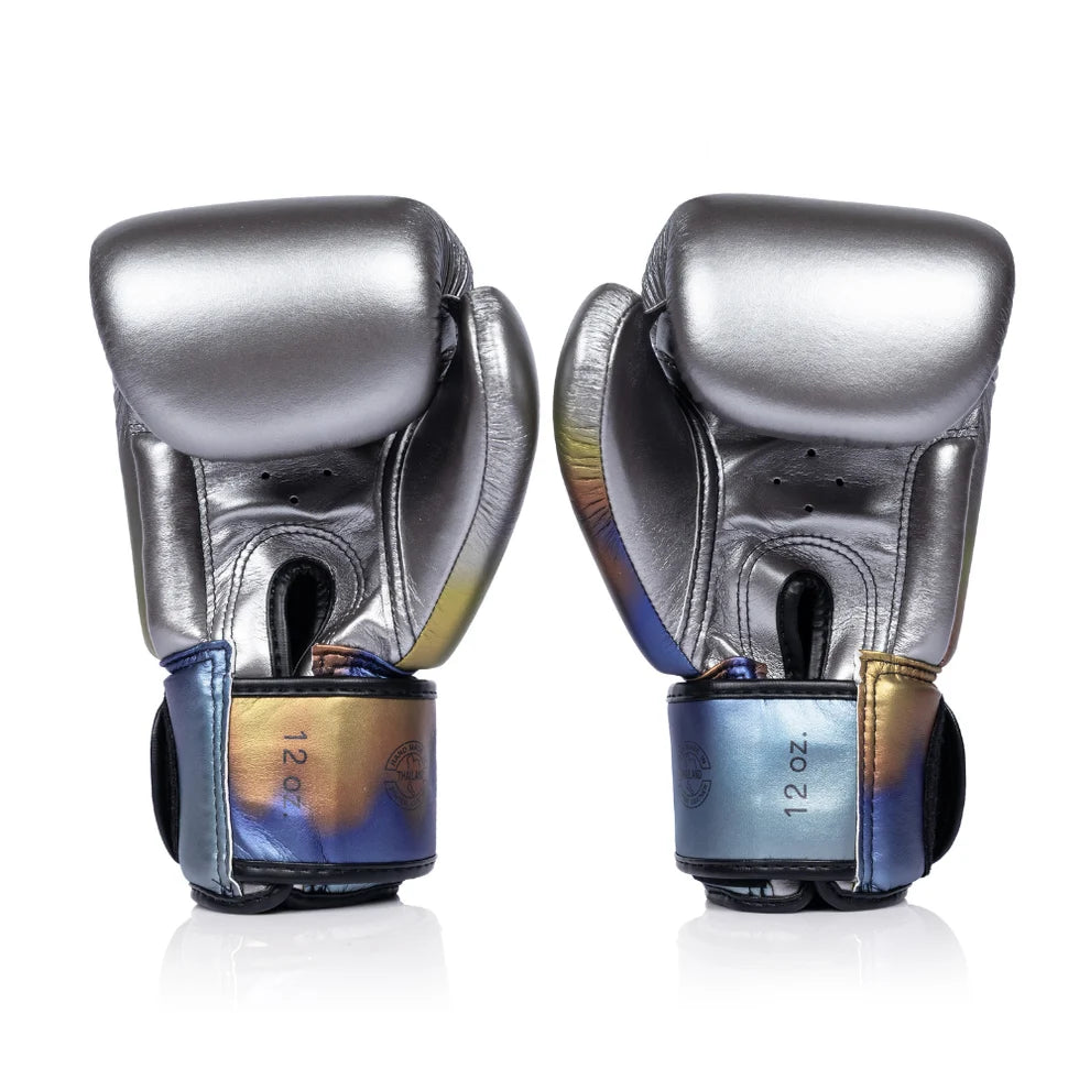 Pair of silver boxing gloves with blue accents on a white background