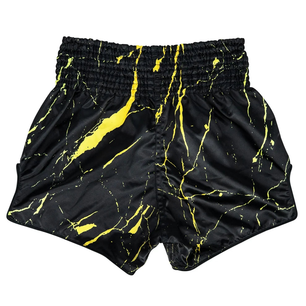 Black shorts with yellow abstract pattern on a white background