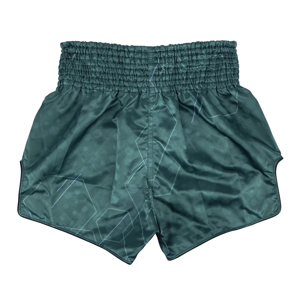 Green shorts with geometric patterns on a white background