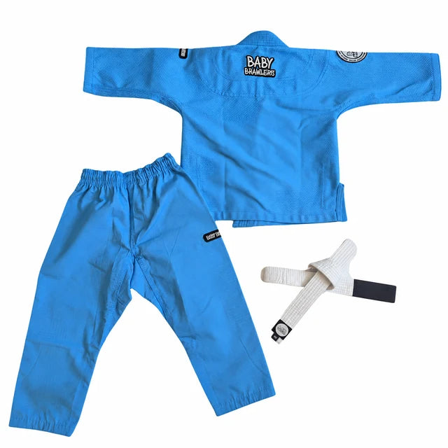 A blue Brazilian Jiu-Jitsu (BJJ) gi set for babies, including a long-sleeve top, matching pants, and a white belt, laid out on a white background.