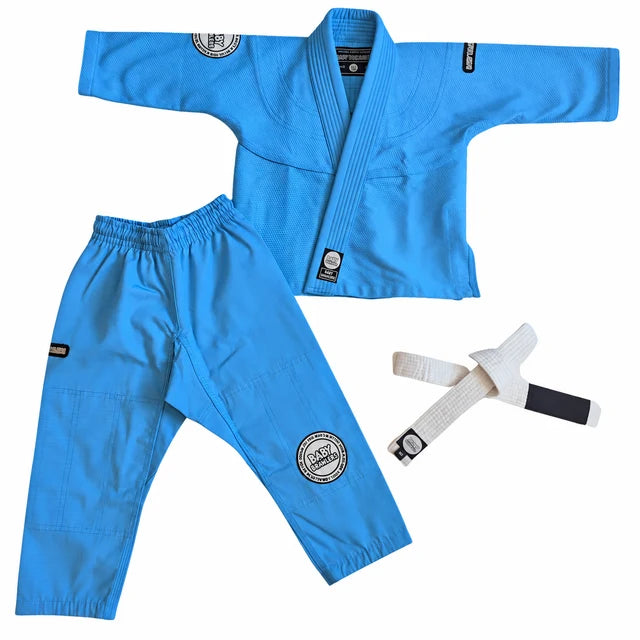 A bright blue martial arts uniform set consisting of a gi jacket, matching pants, and a white belt with black tips, laid out on a plain white background.