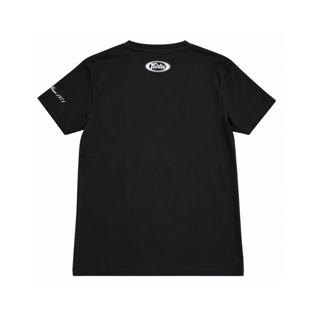 A black short-sleeve t-shirt shown from the back, featuring a small white oval logo centered below the collar and white text printed on the left sleeve, displayed against a solid white background.