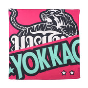 Yokkao branded product with a tiger design on a pink background