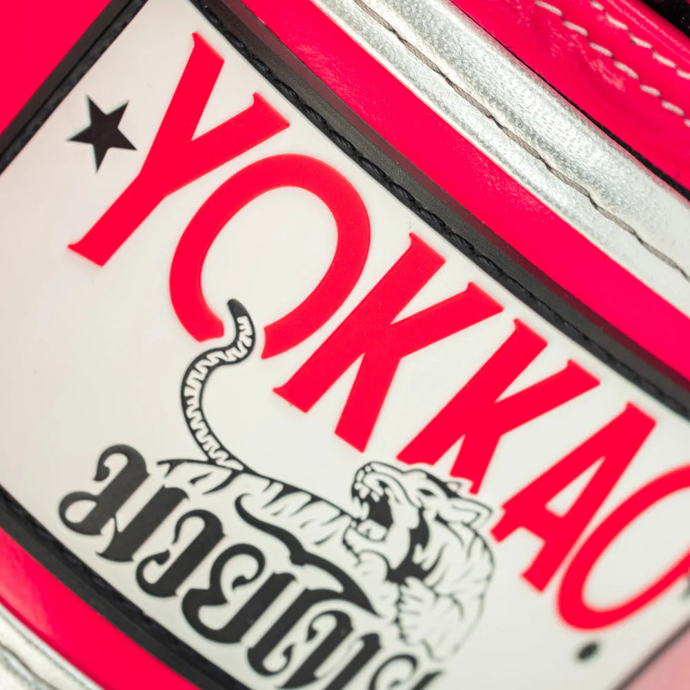 Silver YOKKAO boxing gloves for Muay Thai training and sparring