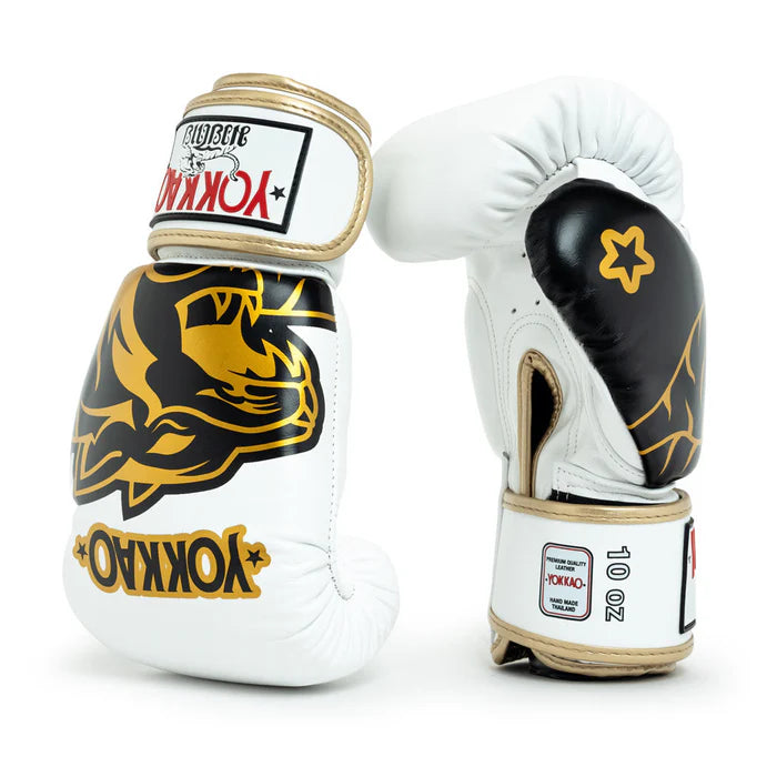 Gold YOKKAO boxing gloves for Muay Thai training and sparring