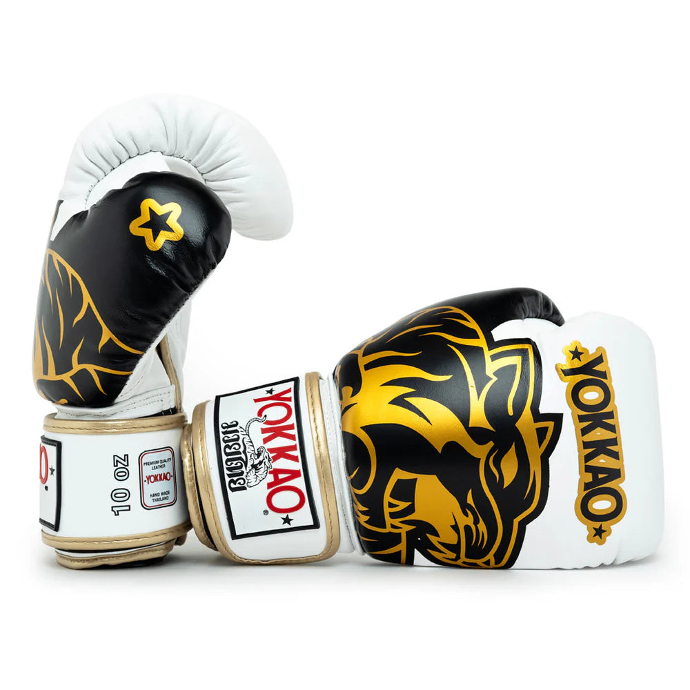 Gold YOKKAO boxing gloves for Muay Thai training and sparring