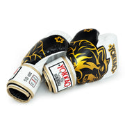 Gold YOKKAO boxing gloves for Muay Thai training and sparring
