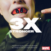 Close-up of a child's mouth with red and black object, text '3X Stronger' and Marvel logo.