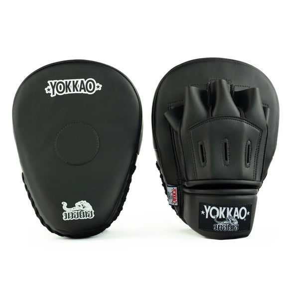 Black Yokkao boxing focus mitts on a white background