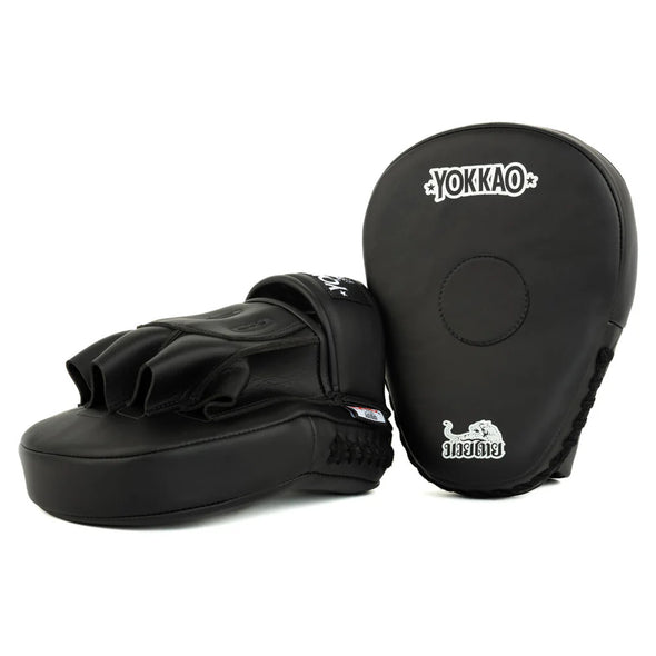 Black martial arts training pads with Yokkao logo on a white background
