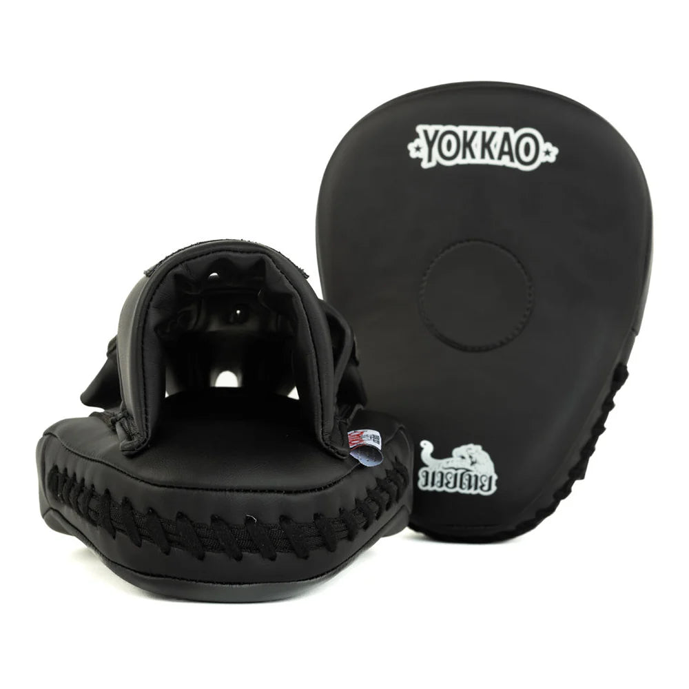 Black martial arts training pads with 'Yokkao' branding on a white background