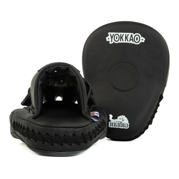 Black martial arts training pads with 'Yokkao' branding on a white background