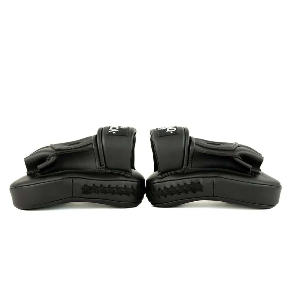 Pair of black wrist guards on a white background