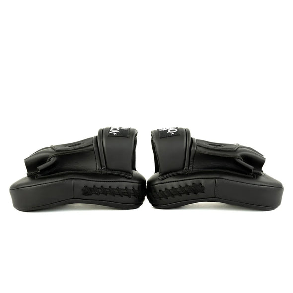 Pair of black wrist guards on a white background