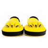 Pair of yellow and black shoes on a white background