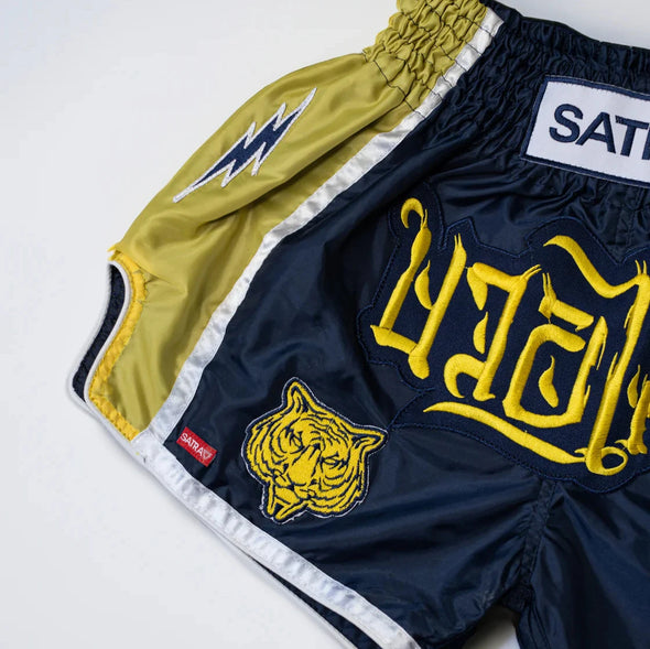 SATRAA WOOT MUAY THAI SHORTS - THE STRIKERS | GOLD PRINT