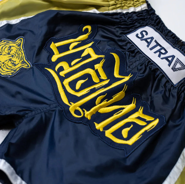 SATRAA WOOT MUAY THAI SHORTS - THE STRIKERS | GOLD PRINT