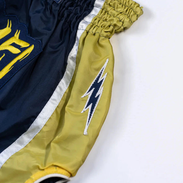 SATRAA WOOT MUAY THAI SHORTS - THE STRIKERS | GOLD PRINT