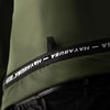 Close-up of a green jacket with a black strap featuring 'HAYABUSA' branding.