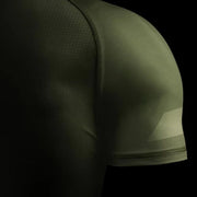 Green athletic shirt with geometric pattern on a black background