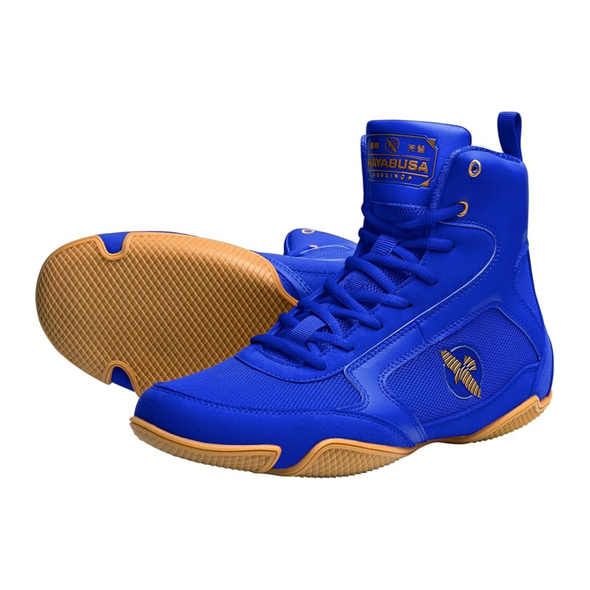 Blue high-top sneakers with tan soles on a white background