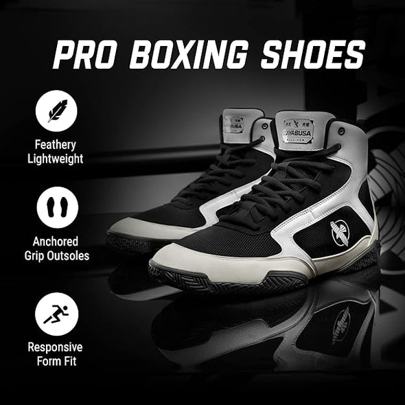 Black and white boxing shoes with features listed on a dark background