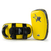 Yellow and black martial arts training pads with visible branding on a white background