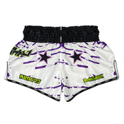 White shorts with purple star patterns and green text on a white background