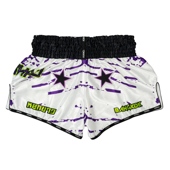 White shorts with purple star patterns and green text on a white background