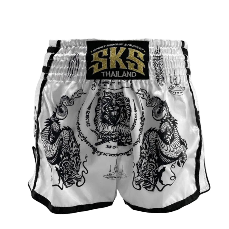 White boxing shorts with black designs and 'SKS Thailand' logo on a gray background