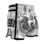 White boxing shorts with black designs and 'Kings Empire' branding on a light gray background