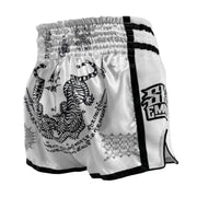 White boxing shorts with black designs and text on a light gray background