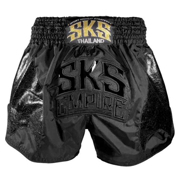 Black Muay Thai shorts with 'SKS Empire' branding on a gray background