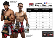 Two boxers wearing SKS Empire boxing shorts with a size chart displayed.