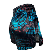 Black athletic shorts with blue and red text and graphics on a light gray background