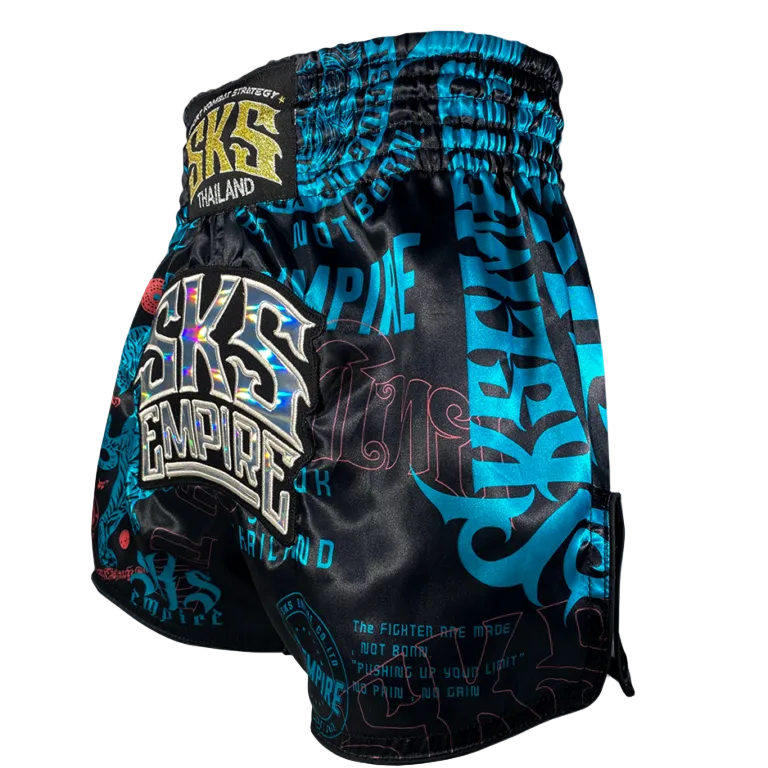Black and blue patterned boxing shorts with visible branding on a gray background