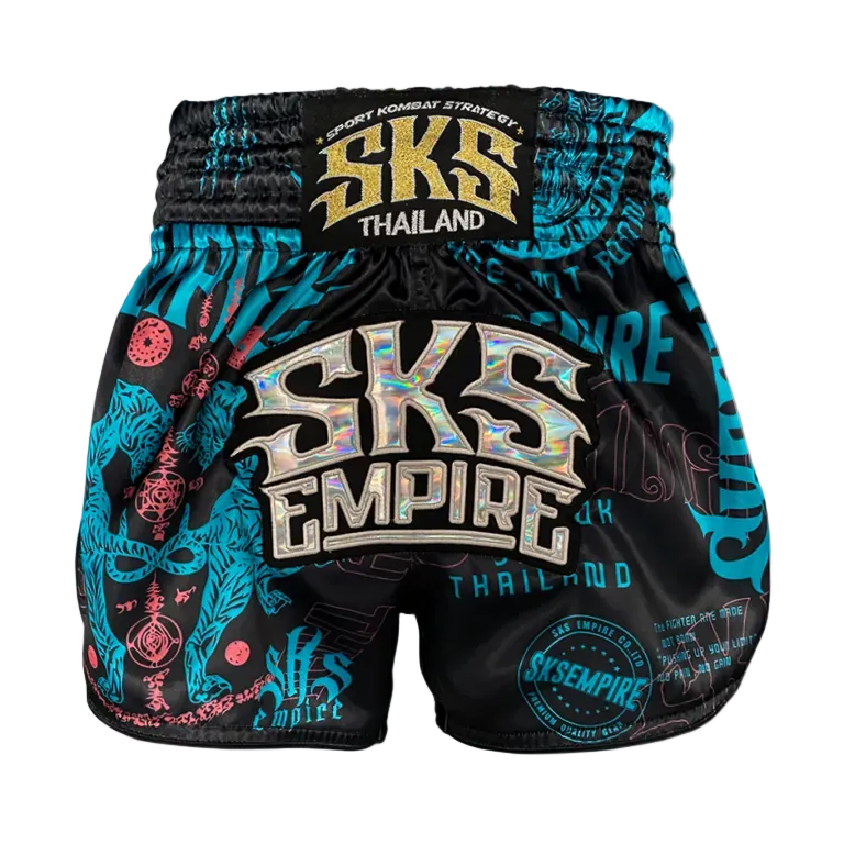 Black and blue Muay Thai shorts with 'SKS Empire' branding on a gray background