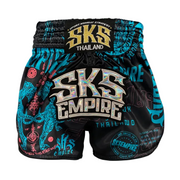 Black and blue Muay Thai shorts with 'SKS Empire' branding on a gray background