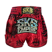 Red boxing shorts with 'SKS Empire' branding on a gray background