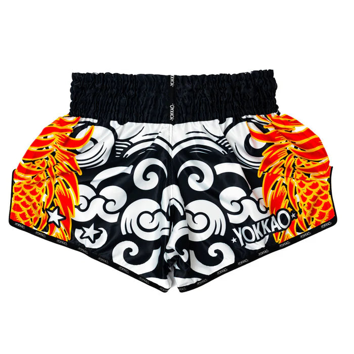 Shorts with black, white, and orange design on a white background