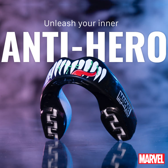 Black mouthguard with Marvel branding on a reflective surface, featuring the text 'Unleash your inner ANTI-HERO'.