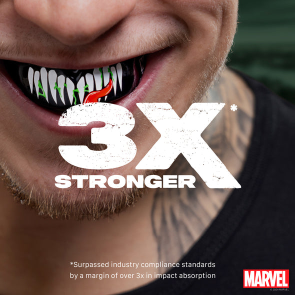 Close-up of a person with a mouthful of teeth, featuring the '3X Stronger' text and Marvel logo.